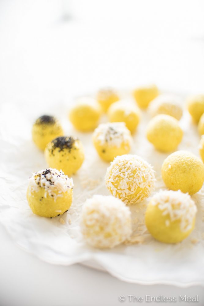 These Coconut Lemon Energy Balls are made with raw cashews, coconut, and lemon juice and zest. They're brightly flavored and a delicious pick-me-up, healthy snack recipe. | theendlessmeal.com