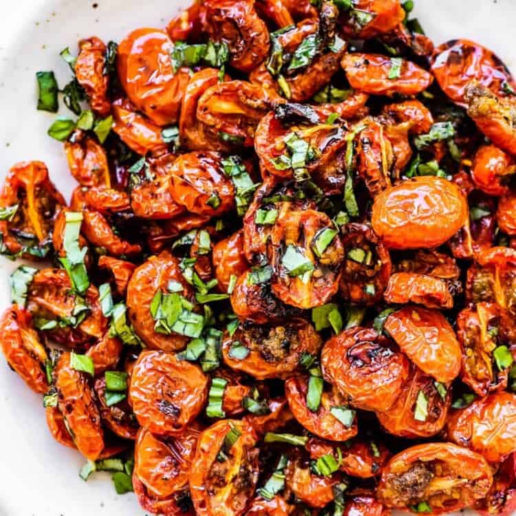 Roasted Cherry Tomatoes piled high in a white bowl.