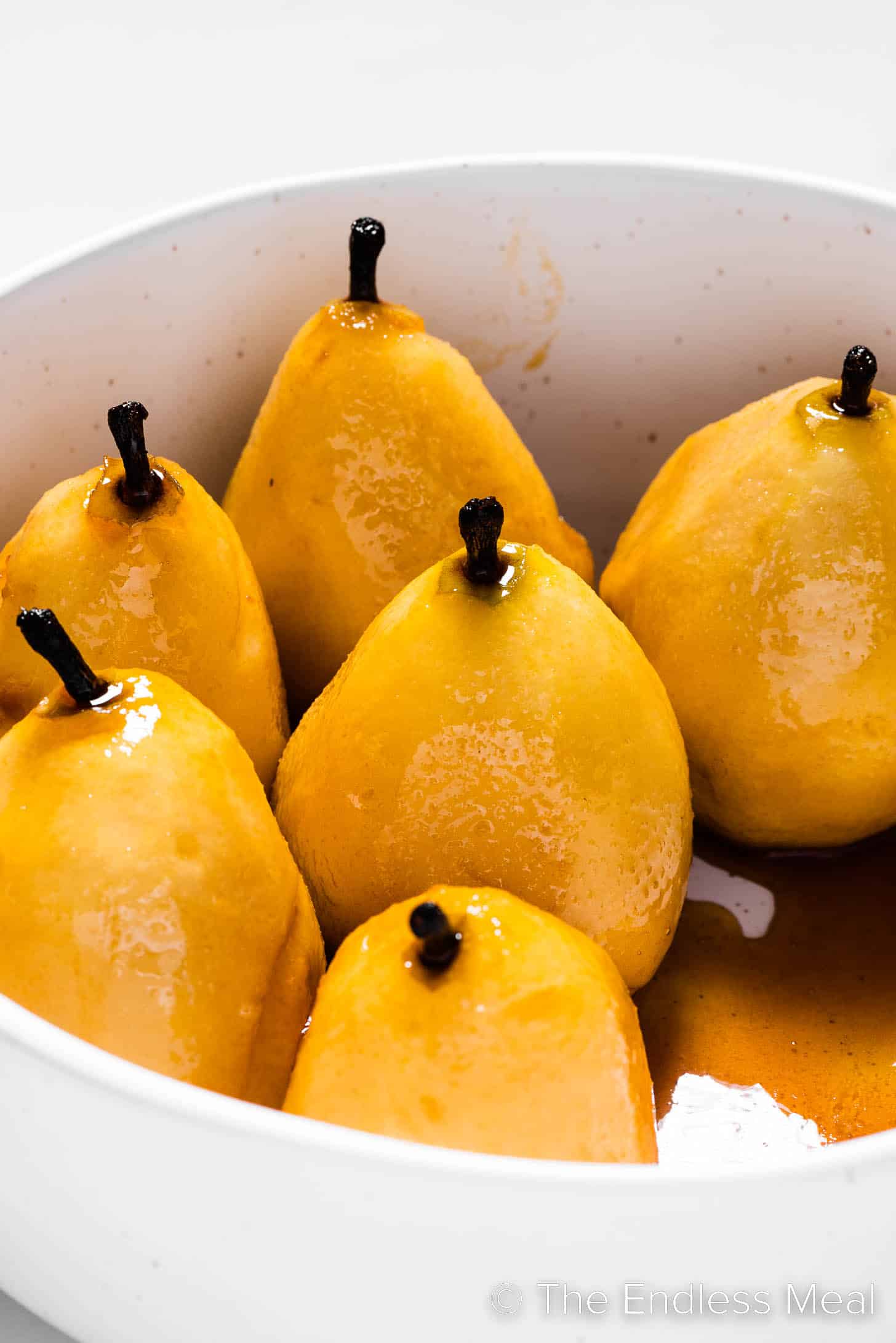 poached pears in a serving dish