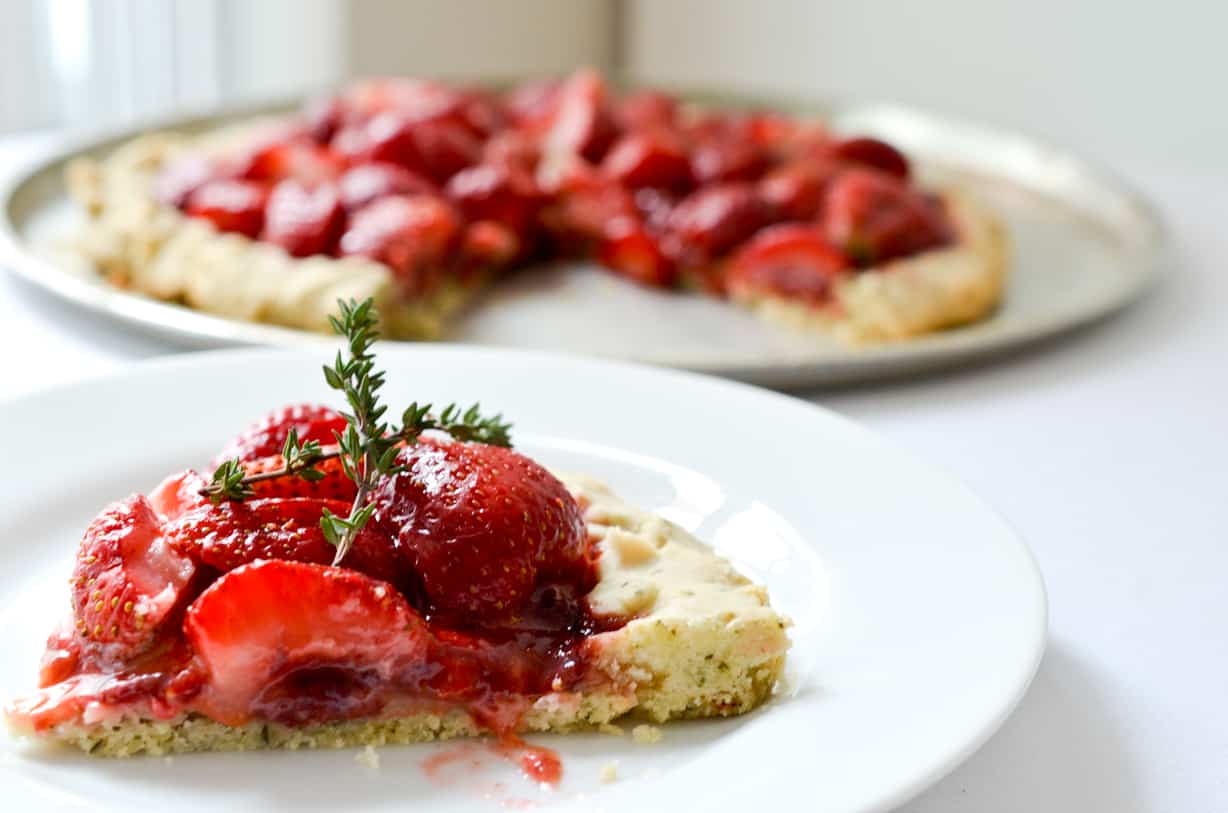 a slice of medieval strawberry tart on a plate. 
