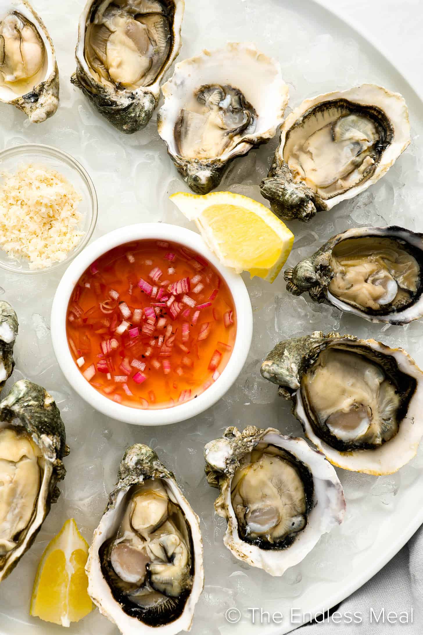 Champagne Mignonette on a plate with shucked oysters