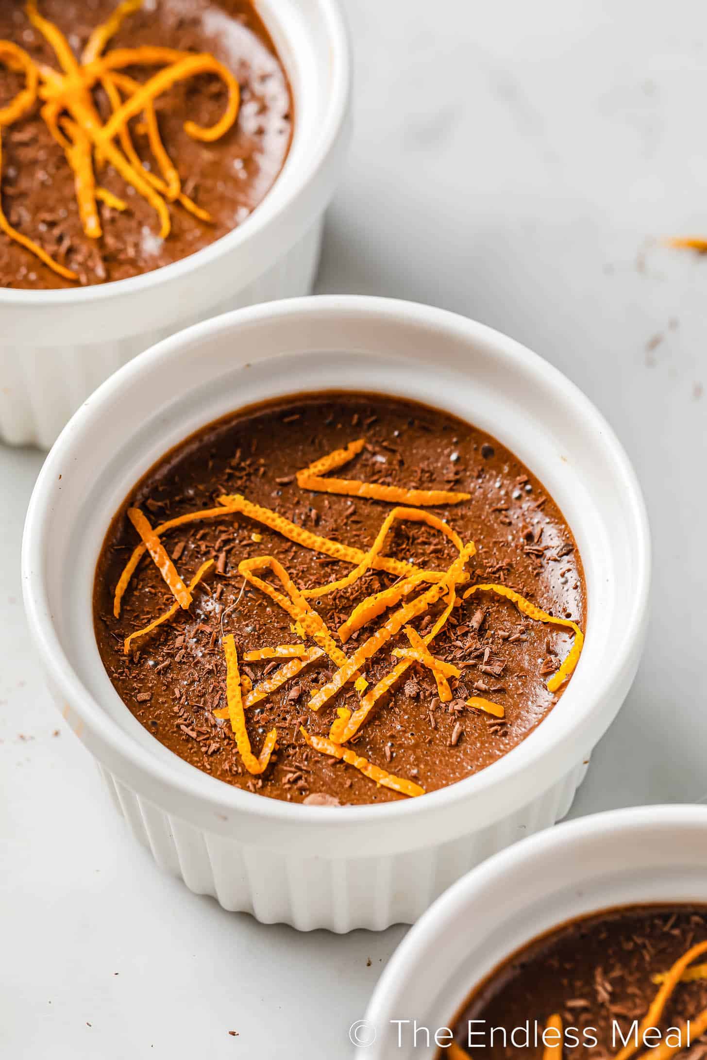 Julia Child's Chocolate Mousse in a white dish with candied orange peel