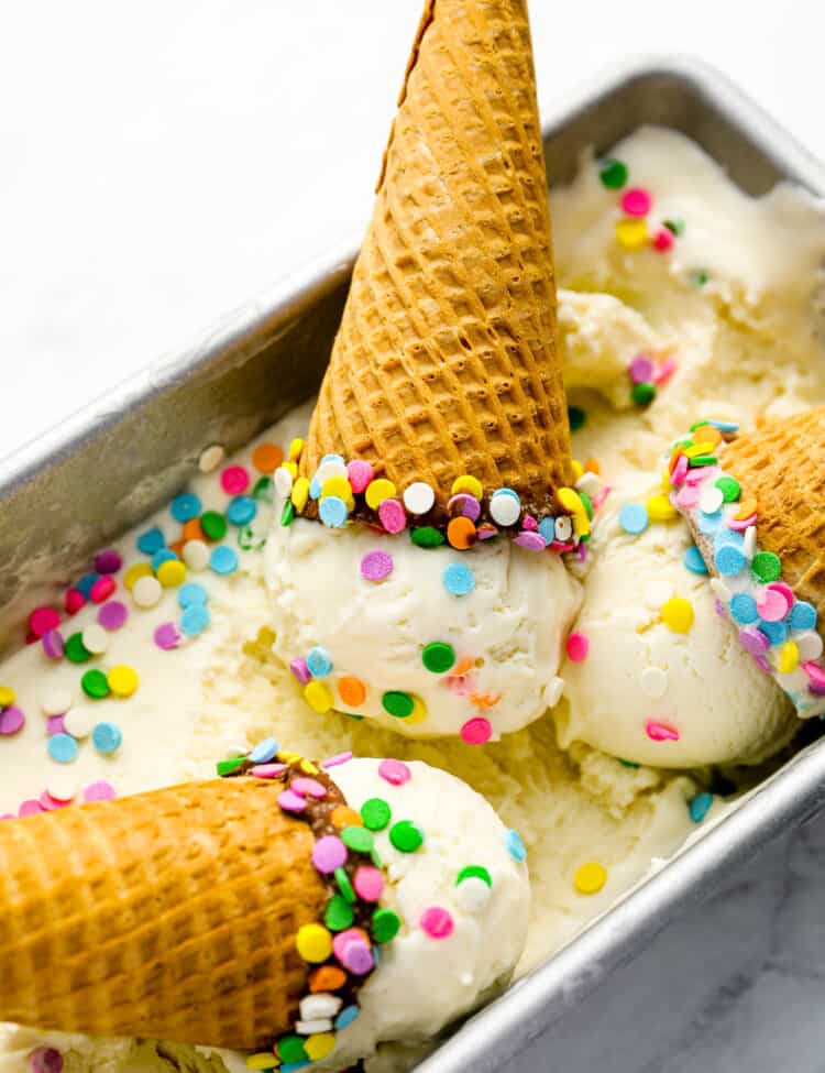 Birthday Cake Ice Cream in a freezer pan with ice cream cones