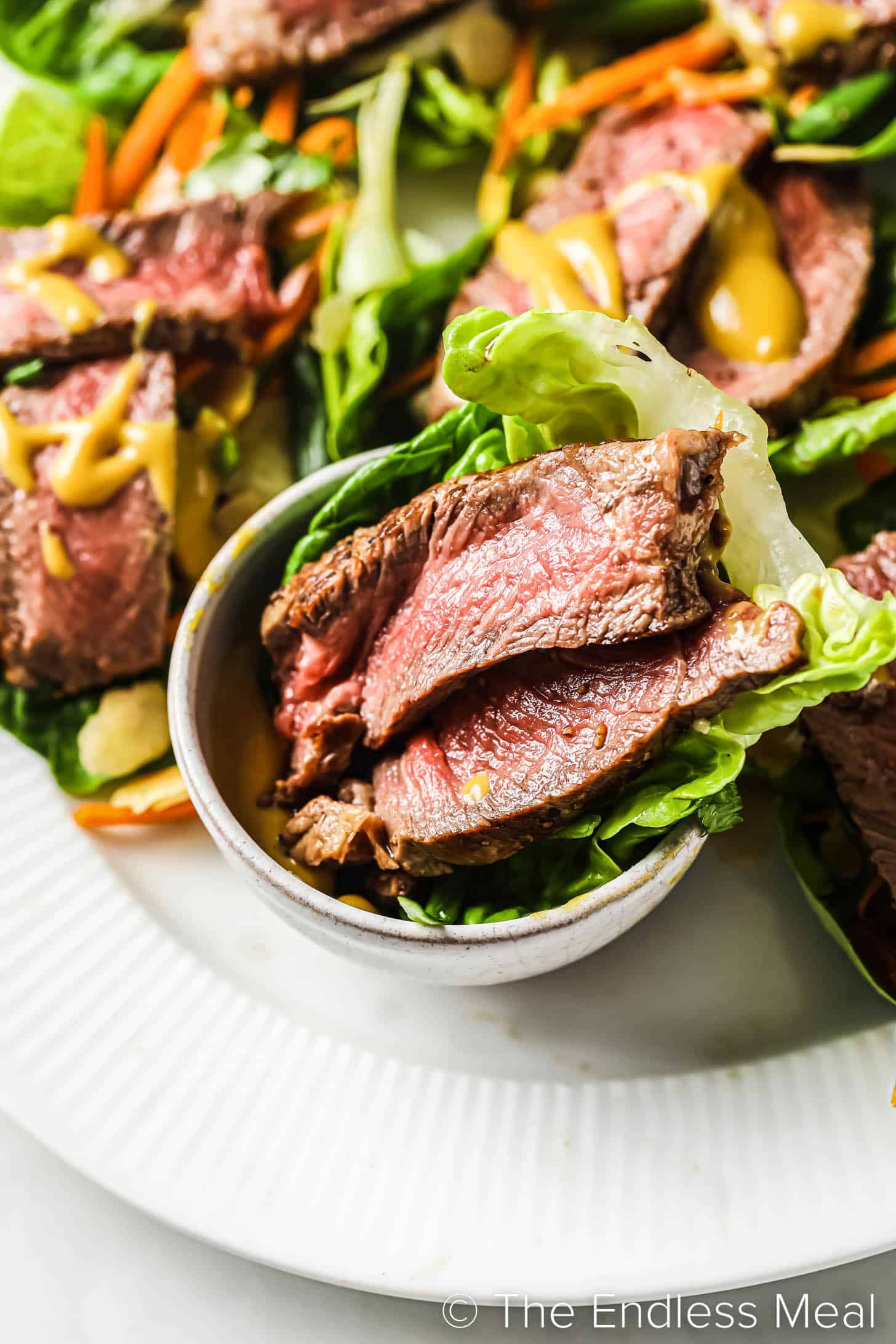 steak lettuce wraps on a plate