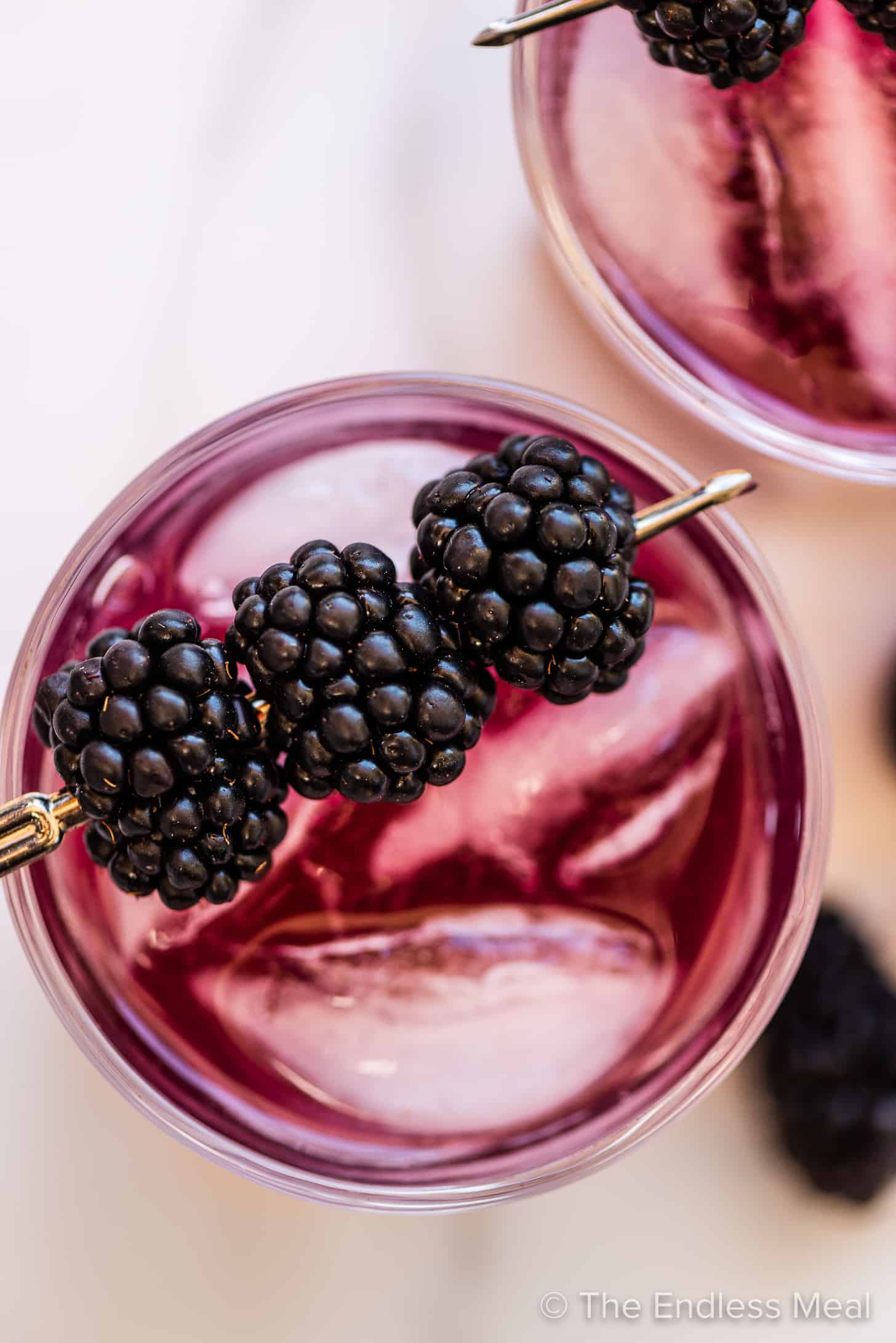 looking down on a glass of blackberry lavender soda