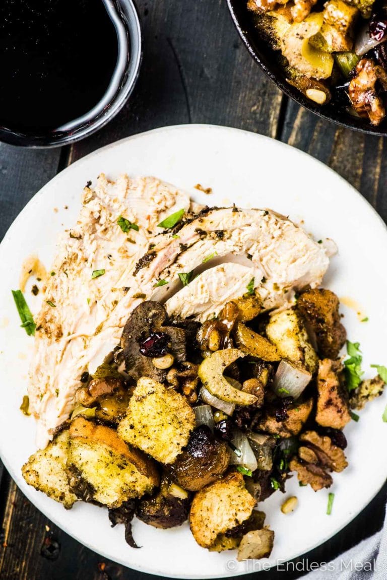 A plate of Thanksgiving dinner with The Best Stuffing Recipe Ever on it. 