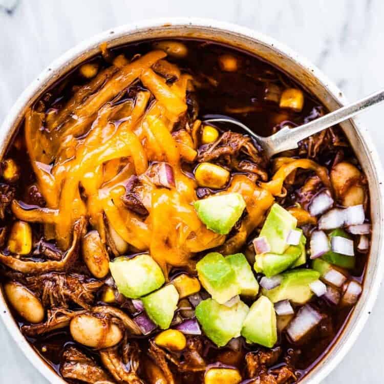 Pulled pork chili in a white bowl
