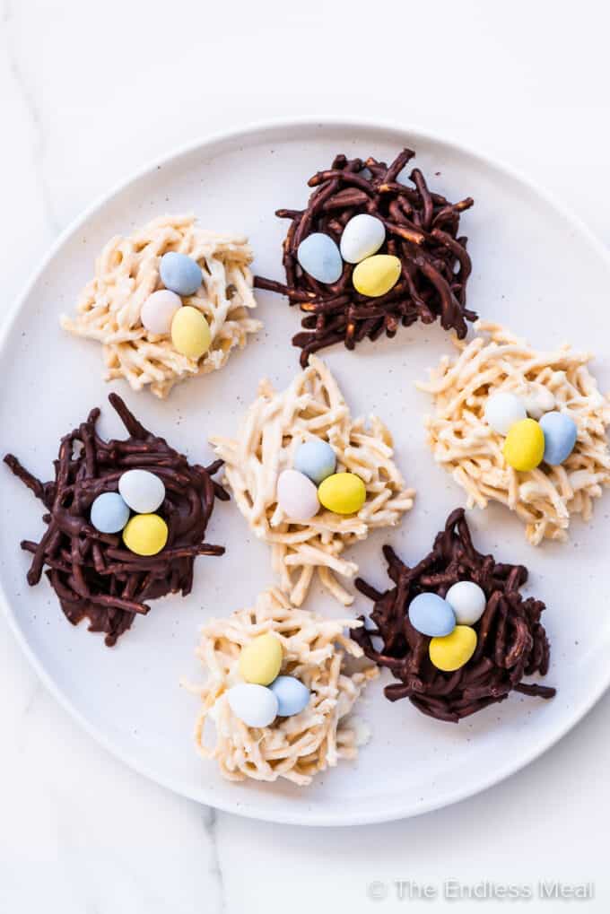 Chocolate Easter Bird's Nest Cookies filled with mini eggson a plate