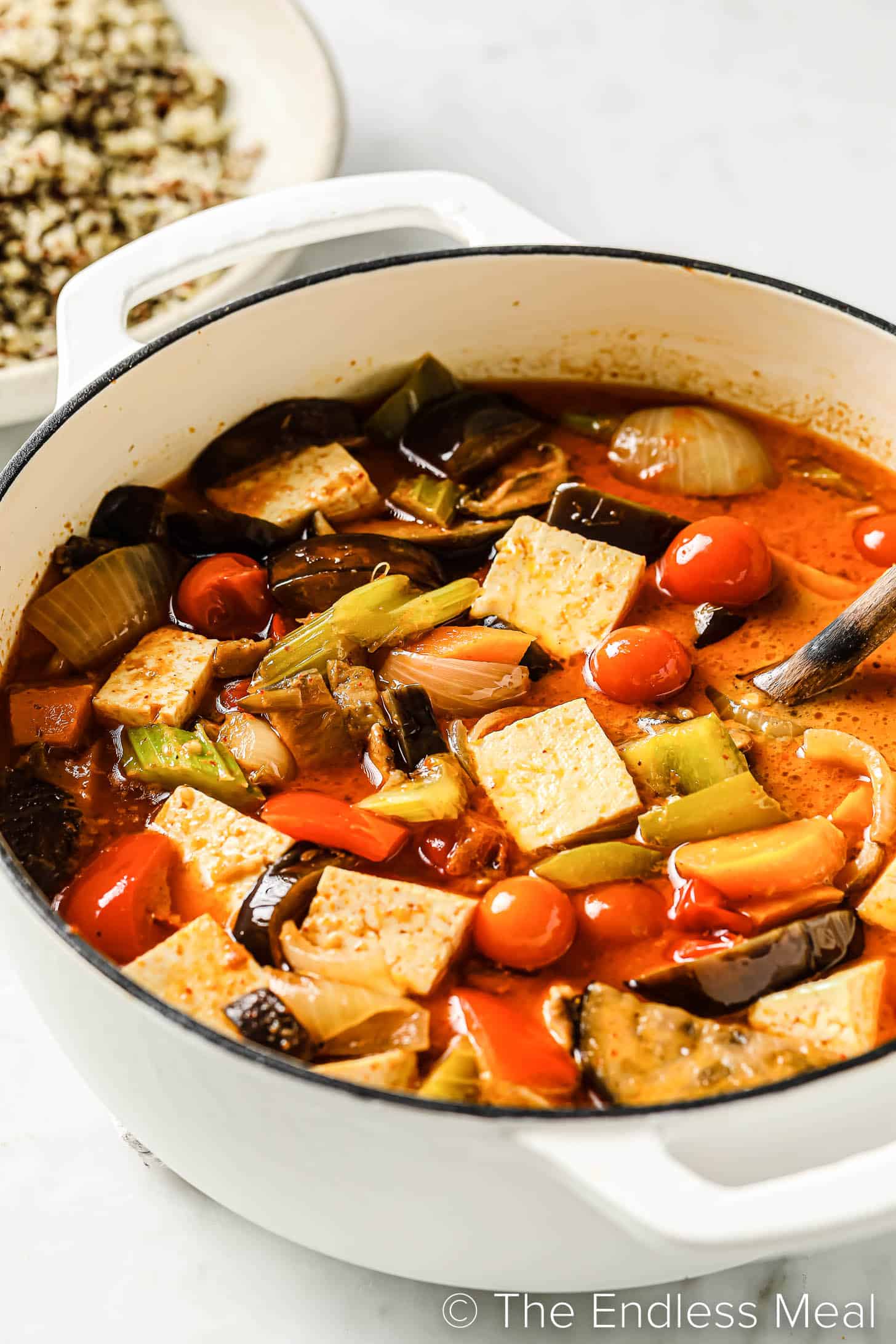 vegan thai red curry in a white pot