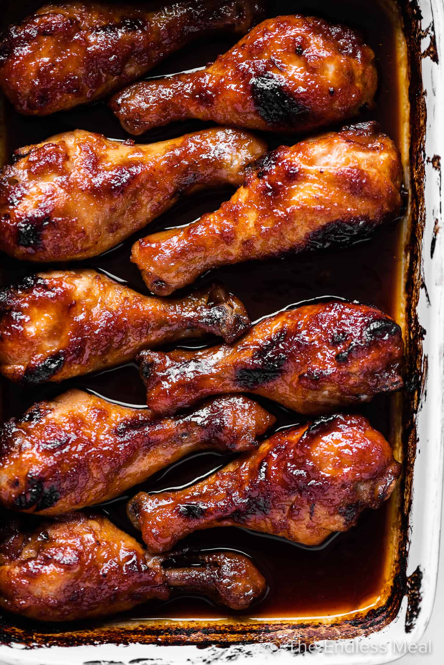 honey sriracha chicken in a baking pan