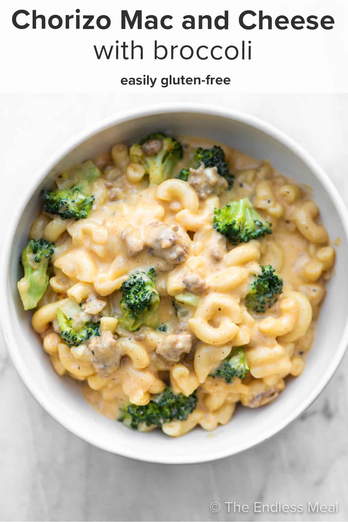 PIN TO SAVE! Broccoli and chorizo mac and cheese is an easy stovetop macaroni and cheese recipe made with delicious chorizo, lots of steamed broccoli, and a creamy cheese sauce. You'll love this easy, family-friendly meal! #theendlessmeal #macandcheese #macaroniandcheese #pasta #pastadinner #pastarecipe #chorizo #chorizomacandcheese #chorizopasta #broccoli #sugarfree #familyrecipe #comfortfood
