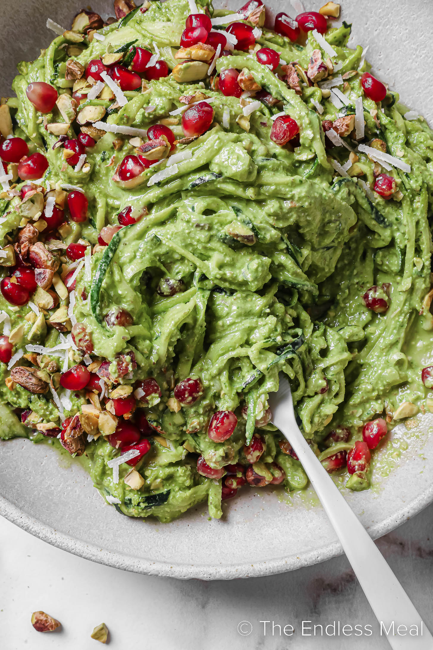 A fork twirling Pesto Zucchini Noodles