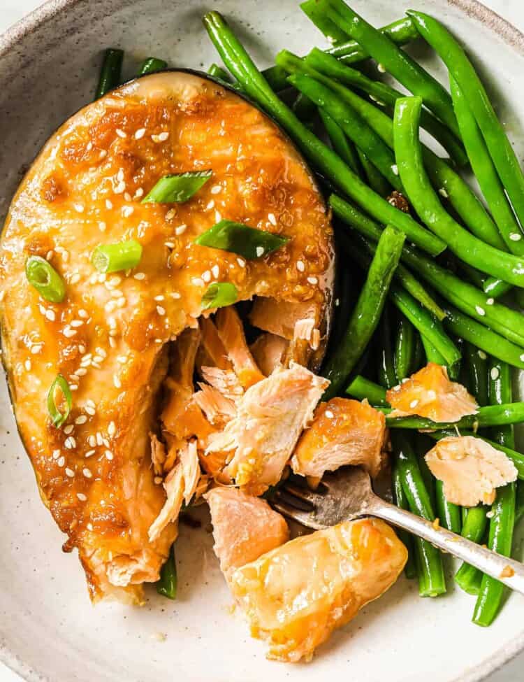 Ginger Miso Salmon Steaks on a plate with green beans