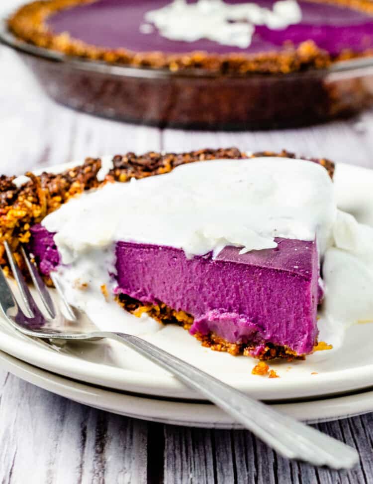 A slice of Vegan Purple Sweet Potato Pie on a dessert plate