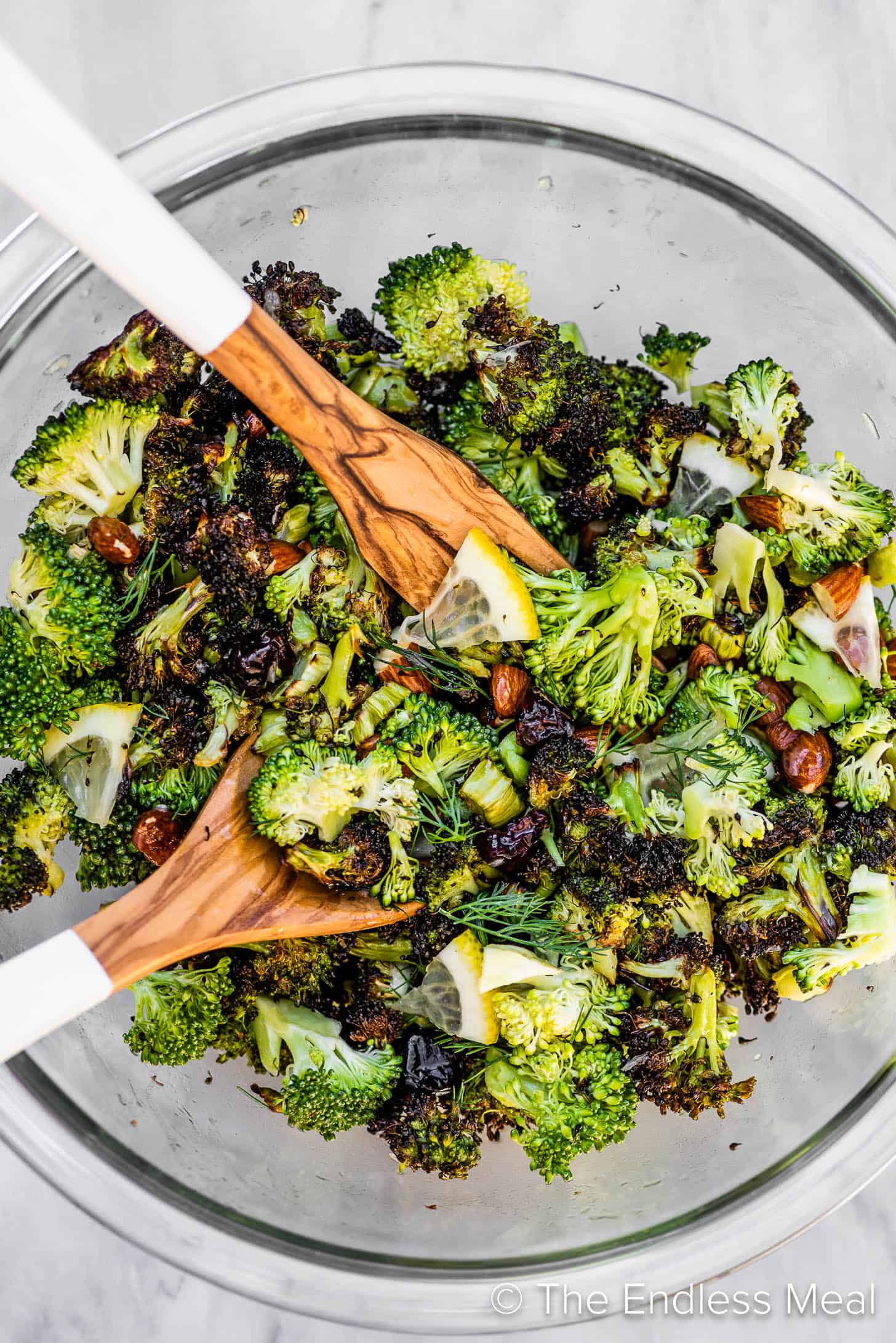 Roasted broccoli salad in a glass bowl