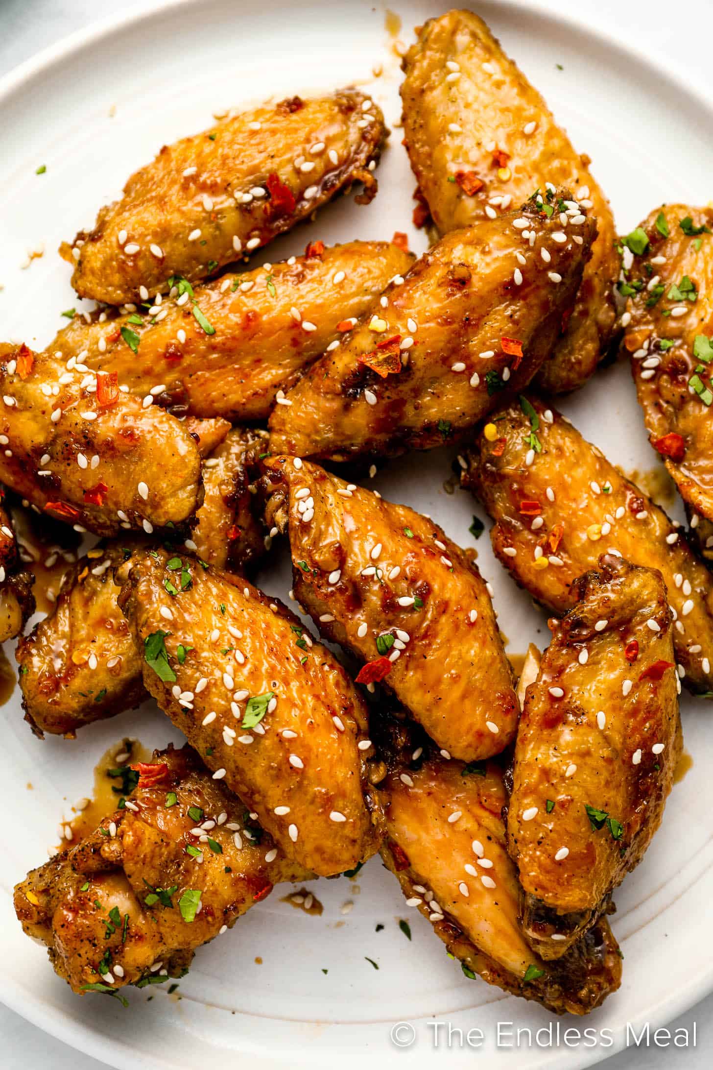 A close up of Honey Garlic Chicken Wings on a plate