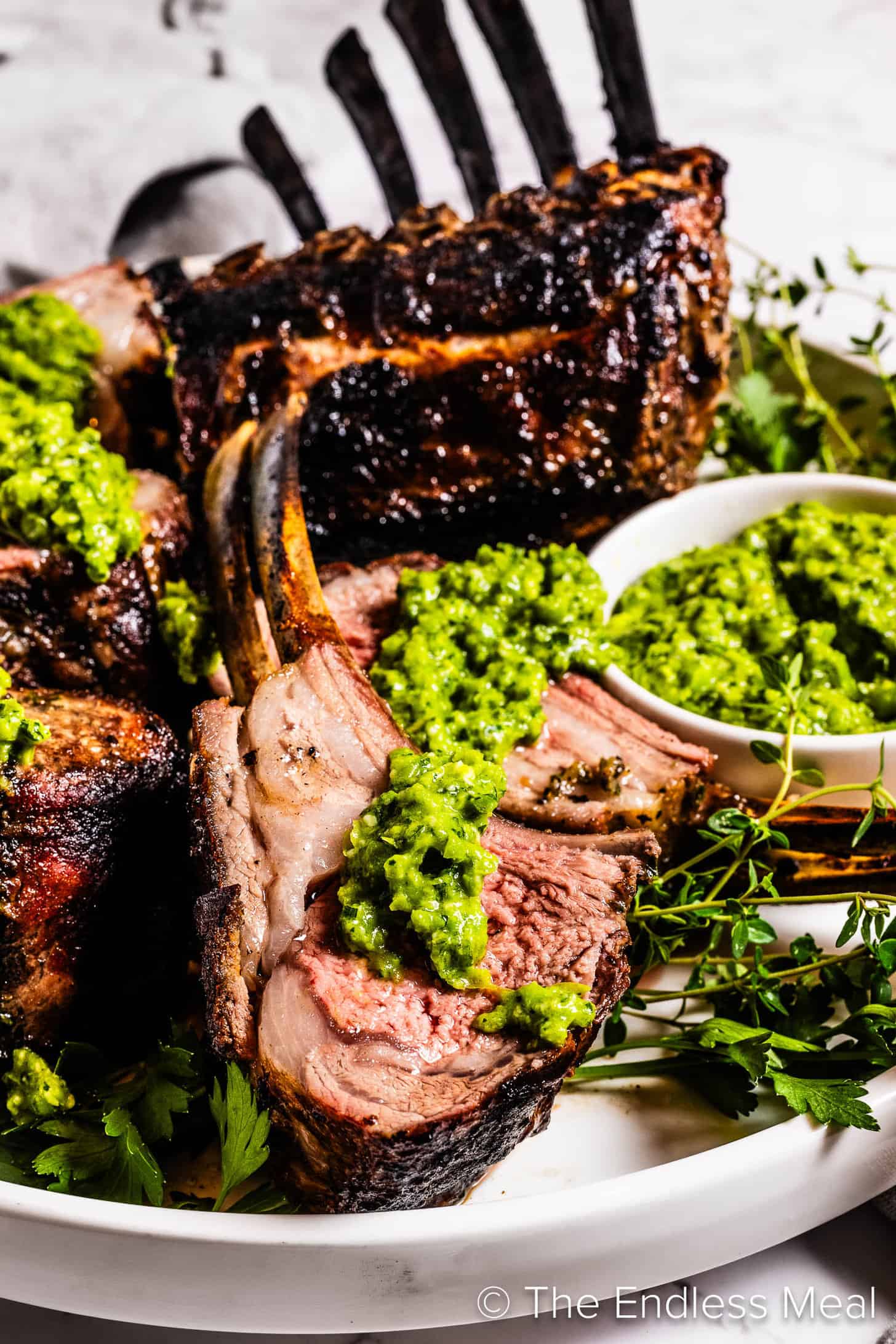 A close up of Grilled Rack of Lamb with mint pesto