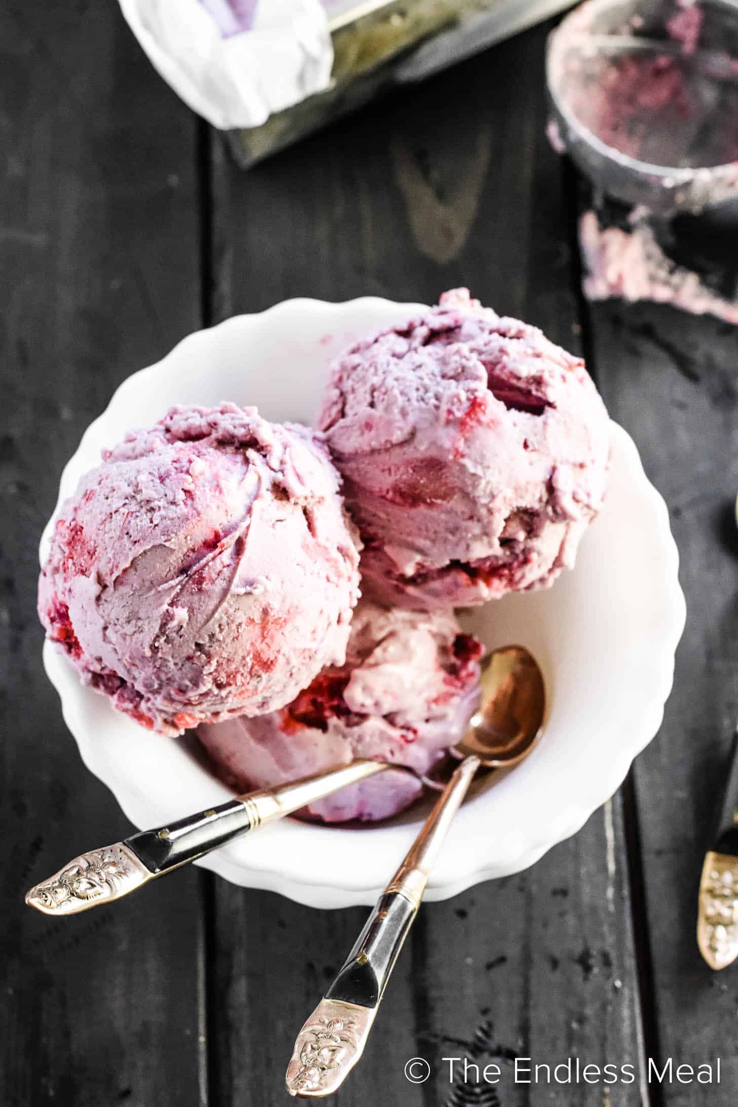 Vegan Strawberry Ice Cream in a white dessert bowl