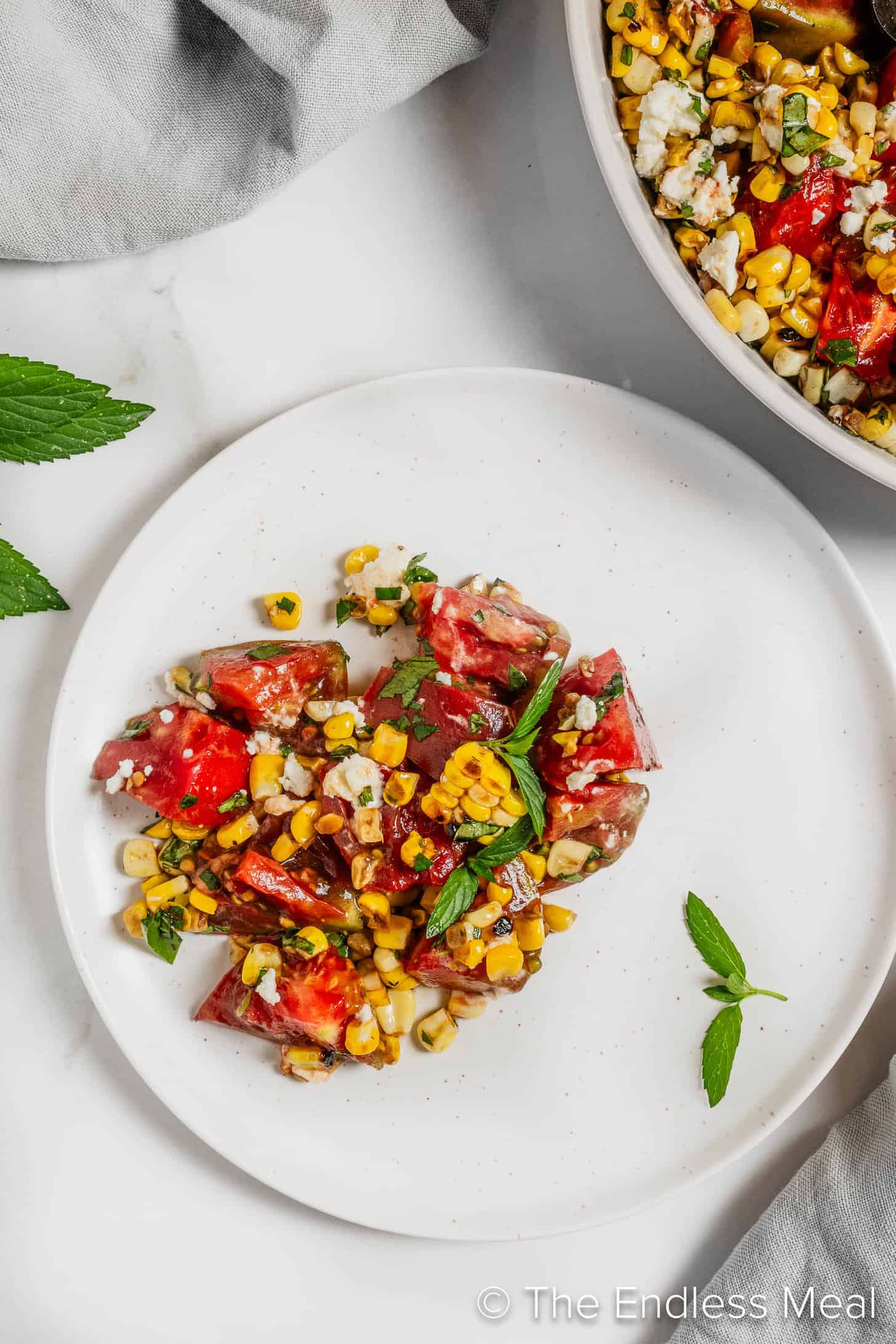 Corn and Tomato Salad on a dinner plate