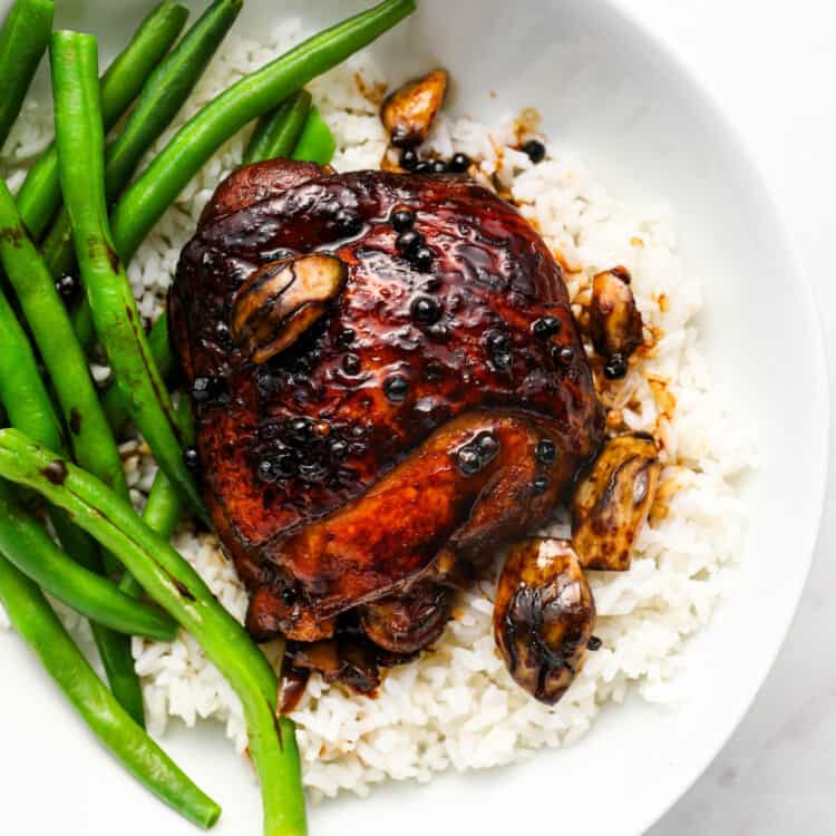 A close up of this Chicken Filipino Adobo recipe on a dinner plate
