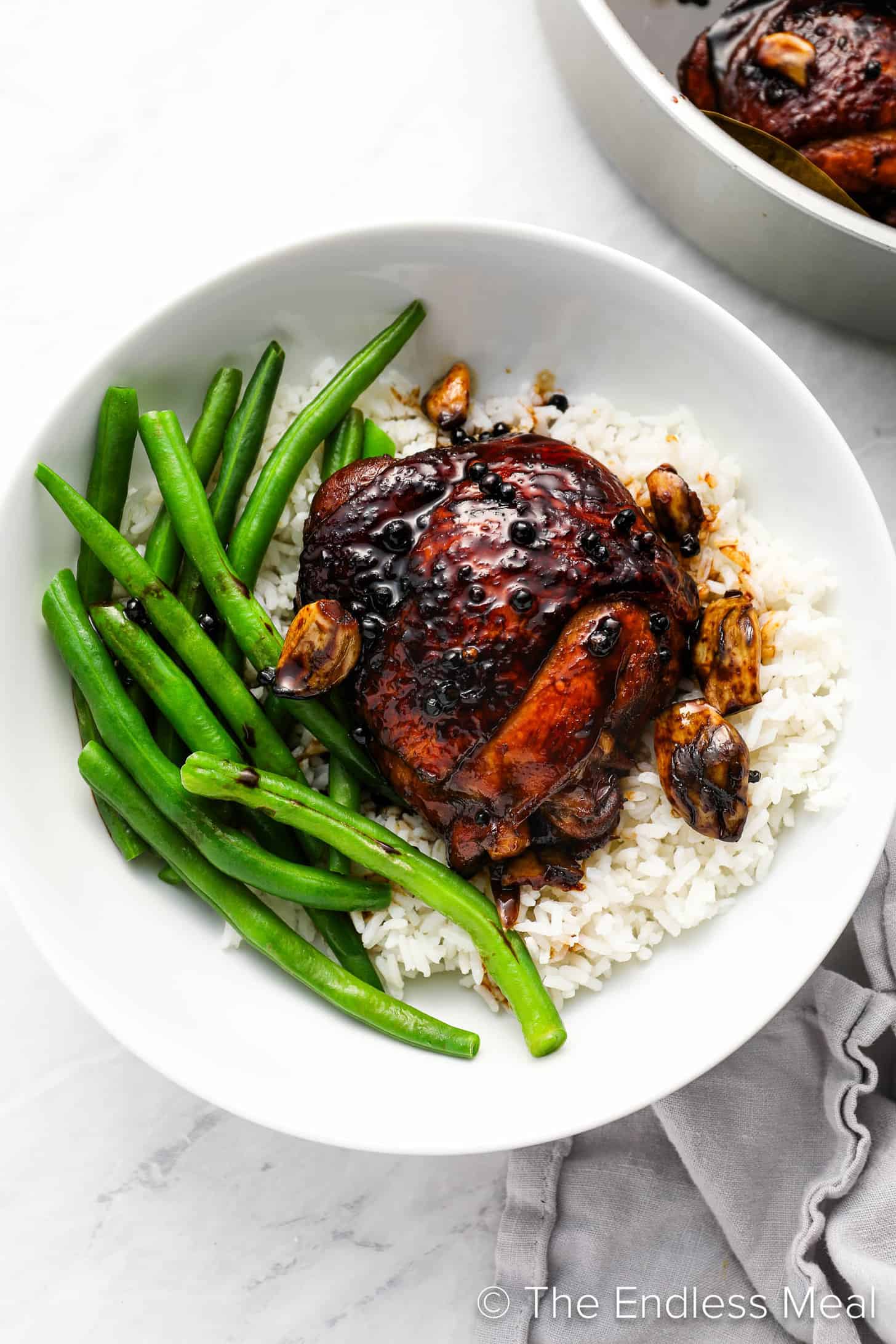Chicken Filipino Adobo on a dinner plate with rice