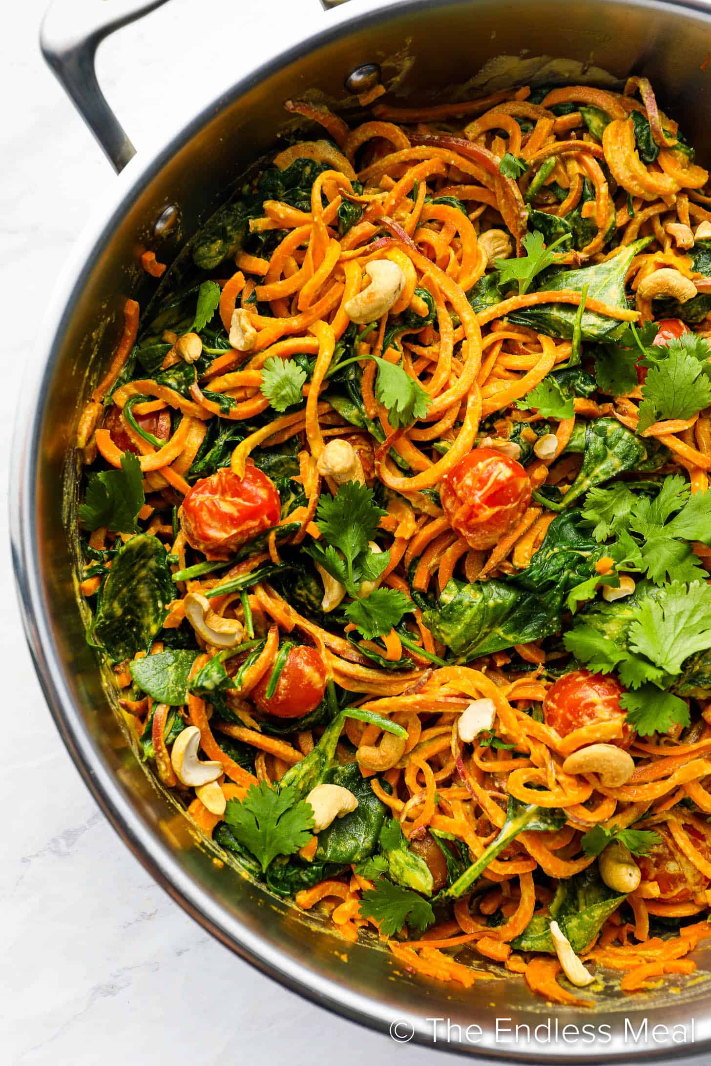 This Sweet Potato Noodles recipe being made in a pan