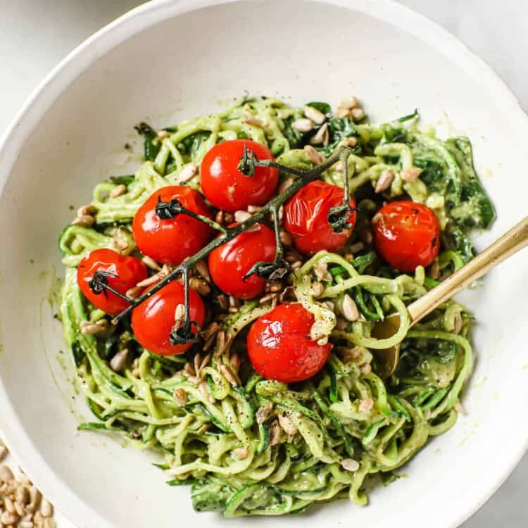 zucchini noodles with pesto in a bowl