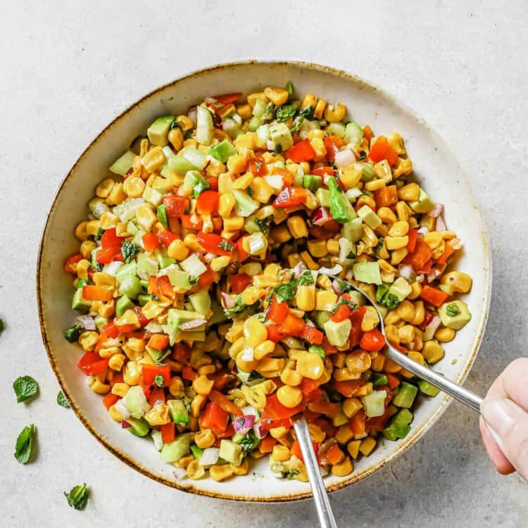 corn salad with avocado in a bowl