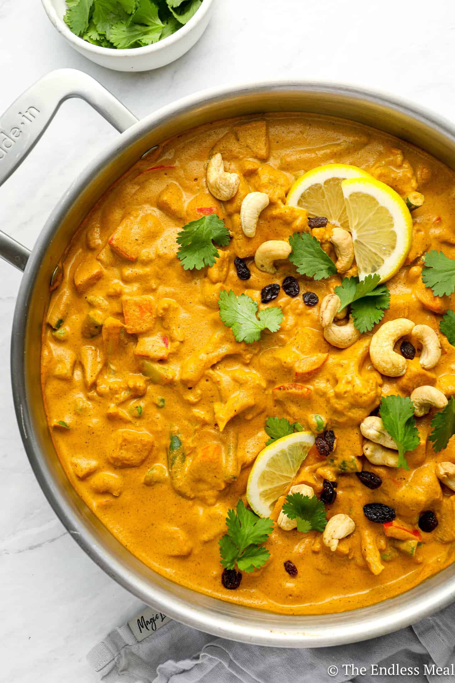 A close up of Vegetable Korma in a pan