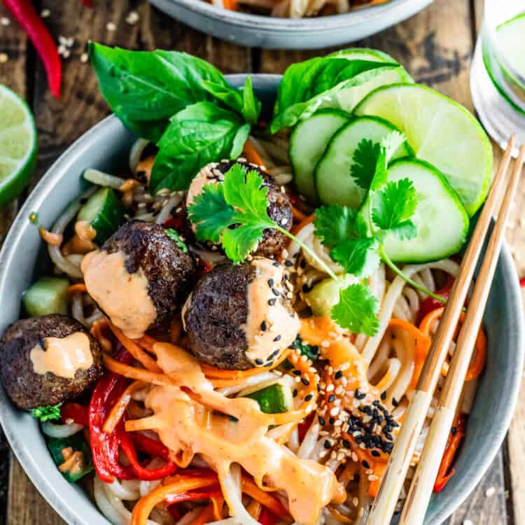 A Banh Mi Noodle Bowls on a dinner table