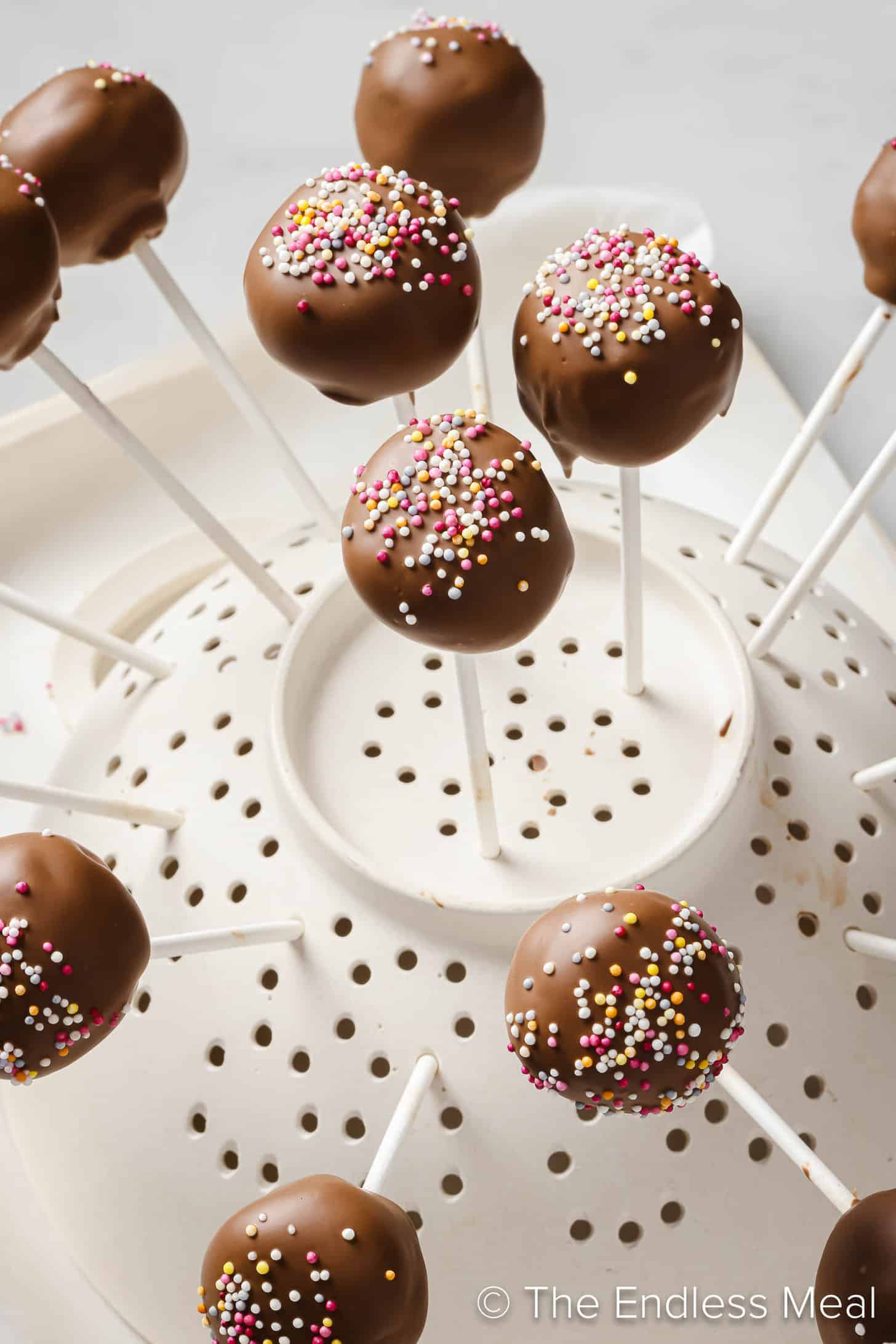 Cookie Dough Cake Pops on a cake pop stand
