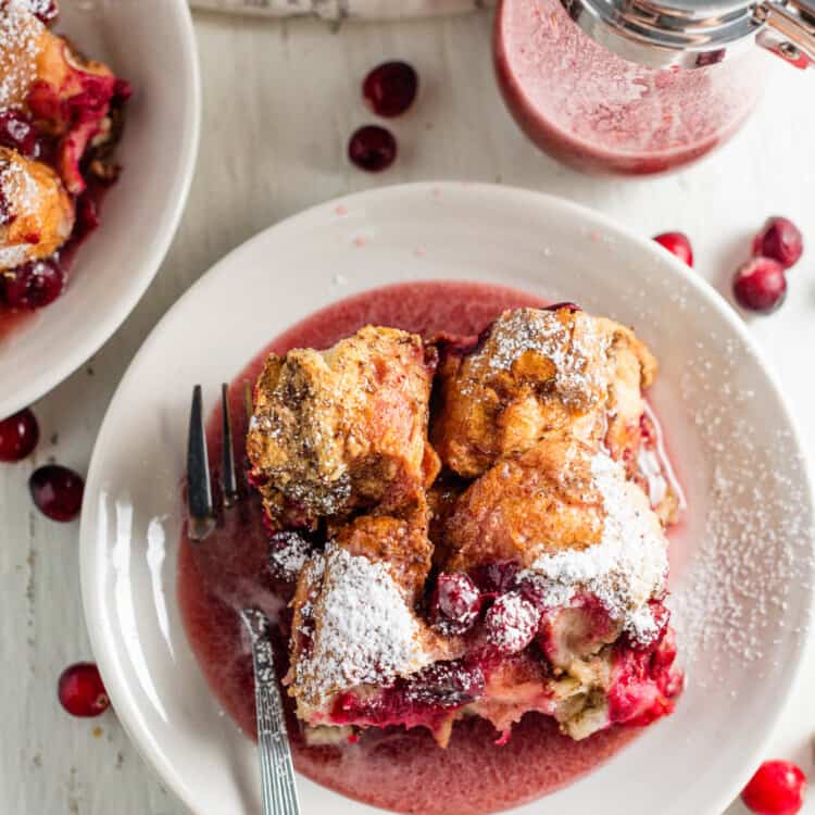Vegan french toast for Christmas on a breakfast plate with cranberry syrup