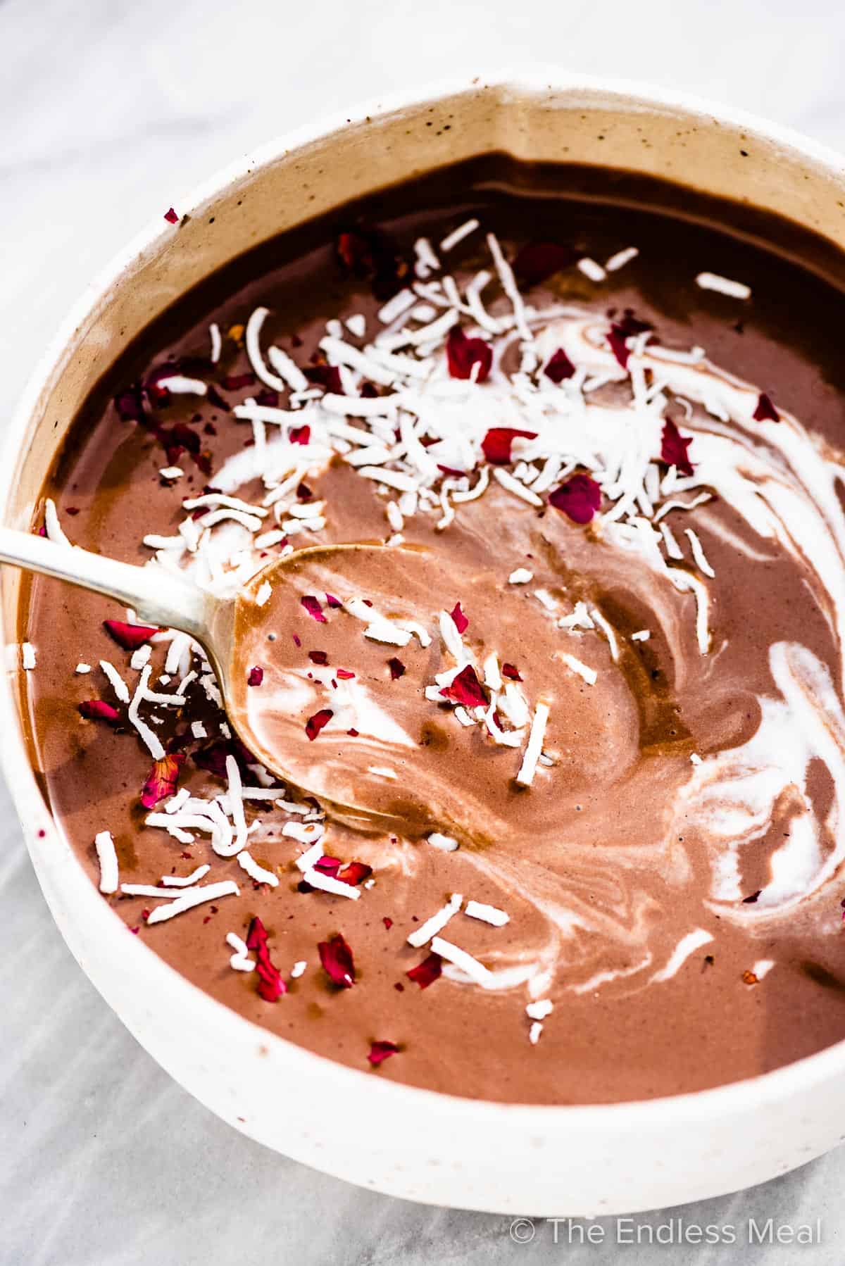 A close up of a chocolate mocha smoothie bowl.