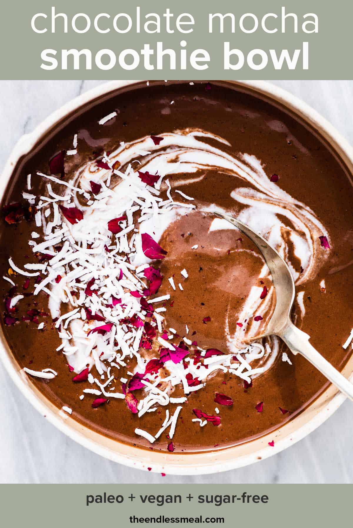 Mocha smoothie in a bowl with pink flowers on the top with the recipe title on the picture.