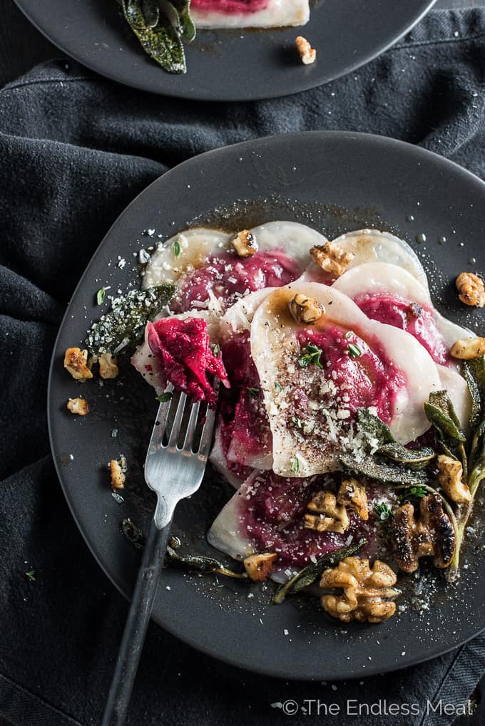 Want to impress your date? Make them Beet and Goat Cheese Wonton Ravioli tossed in brown butter and sprinkled with crispy sage and walnuts. It'll be our secret that the ravioli is made with wonton wrappers and is SUPER easy to make. Wonton ravioli is a perfect Valentine's Day dinner recipe or for anytime you're looking for something a little extra special. | theendlessmeal.com