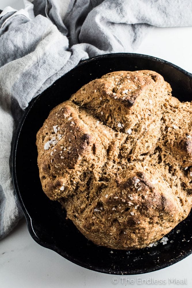 Whole Wheat Irish Soda Bread is a breeze to make and so delicious. If you have 5 minutes to spare you can whip up a batch and sit back while it bakes and fills your house with the smell of fresh baked bread. | theendlessmeal.com