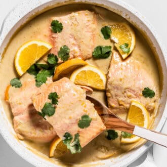 Coconut Orange Poached Salmon in a pan