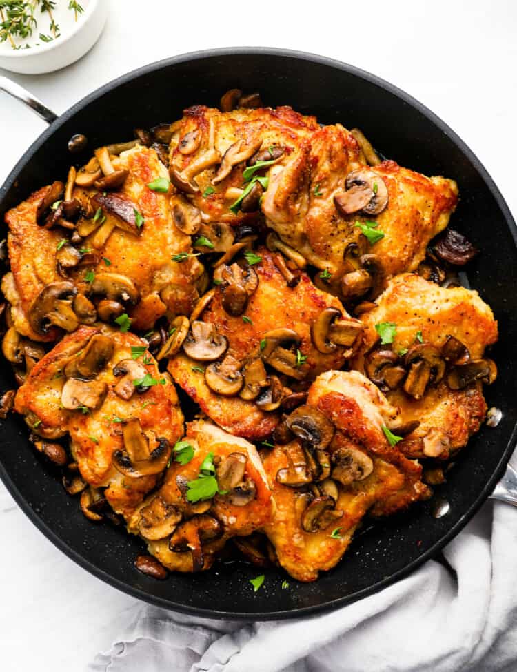 Chicken and Mushrooms recipe being cooked in a frying pan