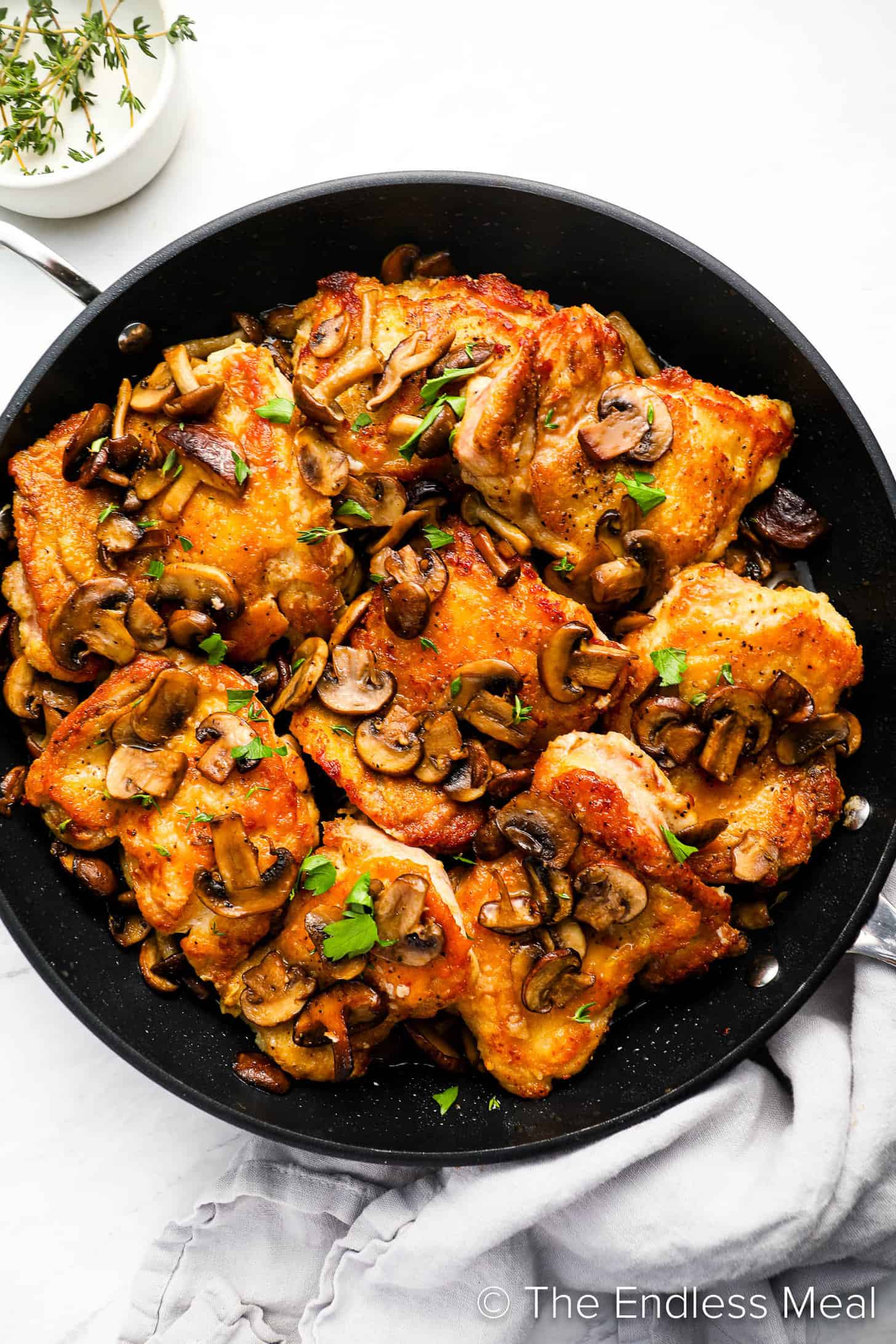 Chicken and Mushrooms recipe being cooked in a frying pan