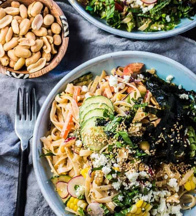 This healthy Thai Noodle Salad recipe is smothered in a crazy delicious feta peanut dressing and loaded with fresh summer veggies. It's an easy to make vegetarian main or side dish that can be served hot or cold. You will LOVE it! | theendlessmeal.com