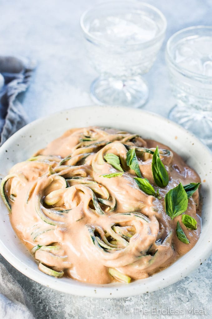 This crazy delicious Dairy Free Tomato Cream Sauce is truly the creamiest pasta sauce around. It tastes like it's made with a carton of cream, but it is 100% dairy free. Even if you eat cheese (like I do) you will LOVE this healthy recipe! It's also paleo + gluten-free + Whole30 compliant and can easily be made vegan.  | theendlessmeal.com