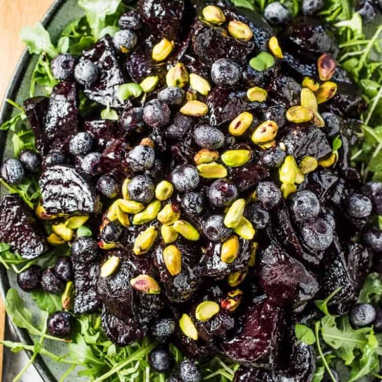 These insanely delicious Balsamic Blueberry Glazed Beets are a must for your holiday table. Or heck, all winter long. The beets are roasted then coated in a sticky glaze made with frozen blueberries and balsamic vinegar. This healthy side dish recipe is also gluten-free + paleo + Whole30 compliant! | theendlessmeal.com