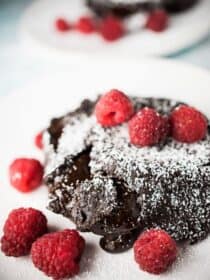 If you're looking for the best Molten Chocolate Lava Cakes recipe, you've come to the right place. These babies are super rich, perfectly sweetened, and every bit as ooey and gooey as they should be. (PS. don't tell anyone but the ingredients are all healthy, too!) | theendlessmeal.com | #lavacake #cake #valentinesrecipes #vitalproteins #collagen #glutenfree