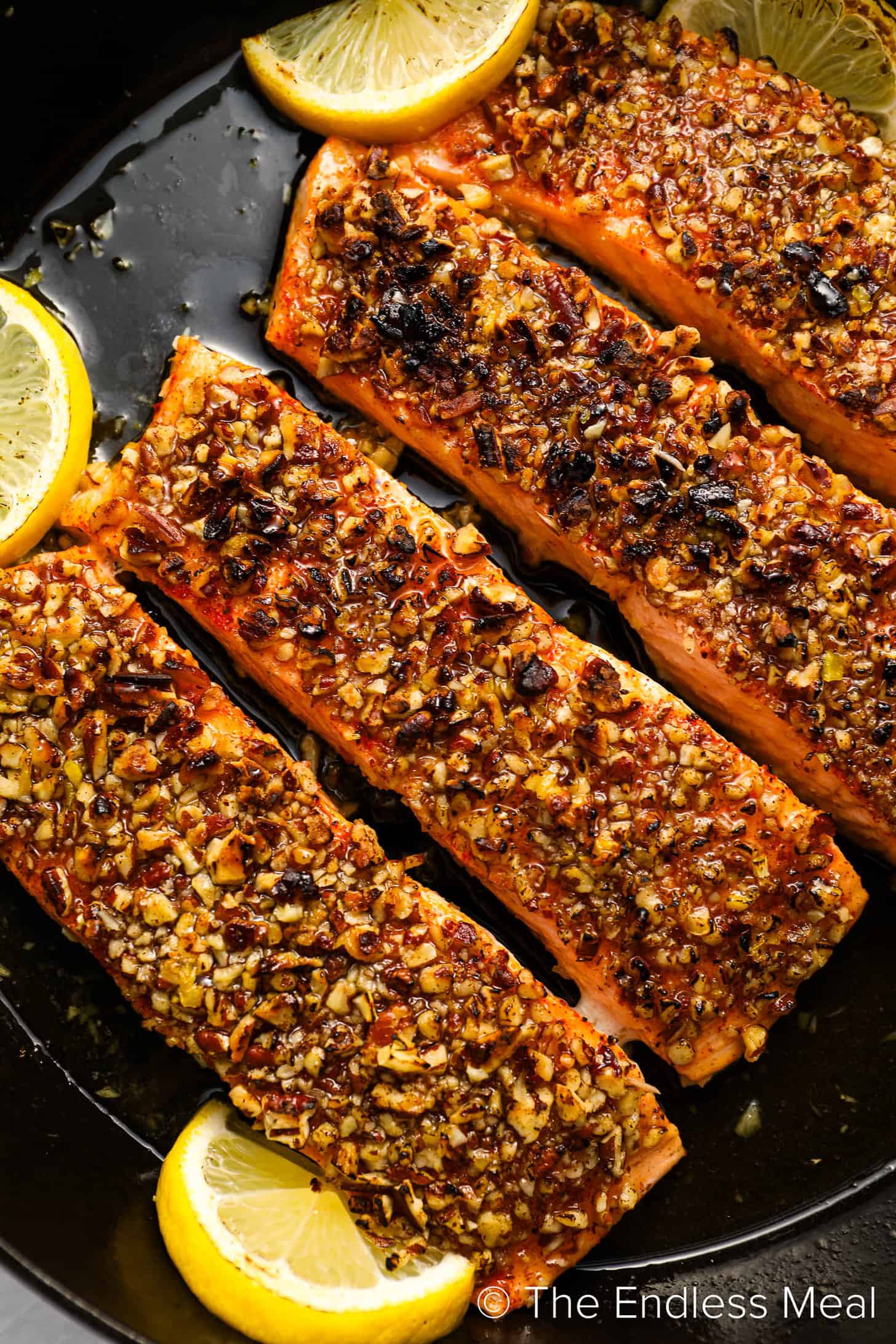 Pecan Crusted Salmon being cooked in a pan