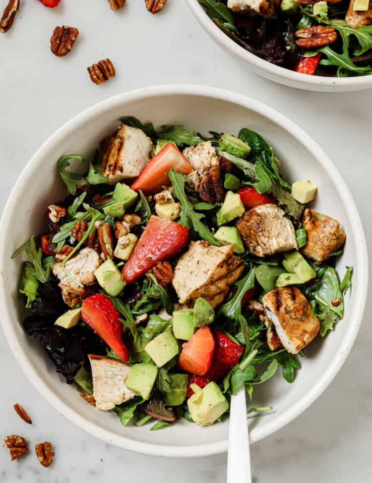 Strawberry Balsamic Chicken Salad in a bowl on the dinner table