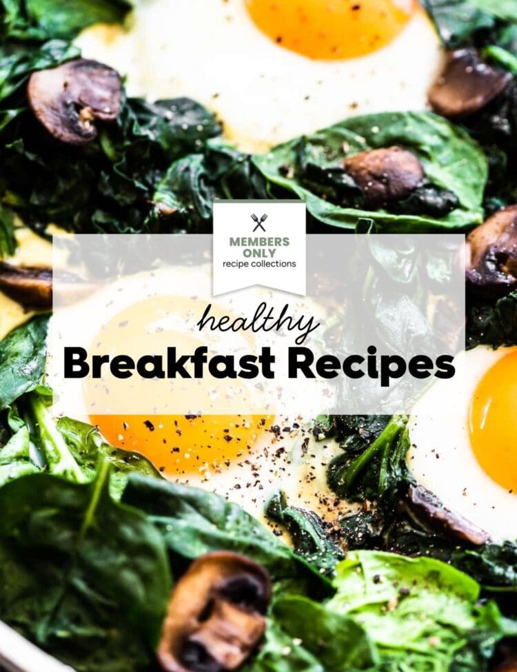 Close-up of cooked eggs, spinach, and mushrooms with the text breakfast recipes overlaid in the center.