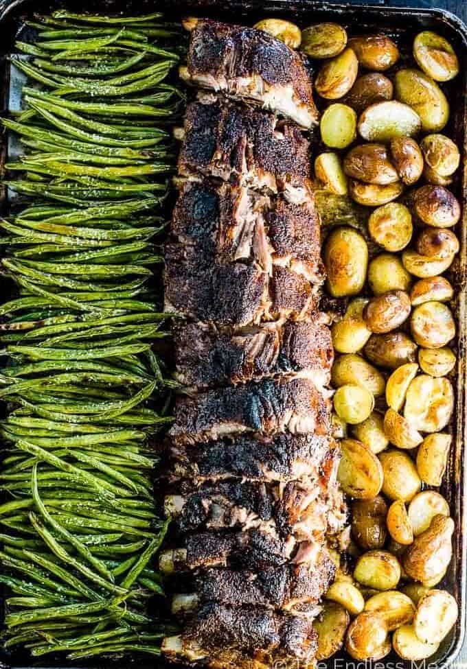Sheet Pan Ribs with green beans on one side and potatoes on the other.