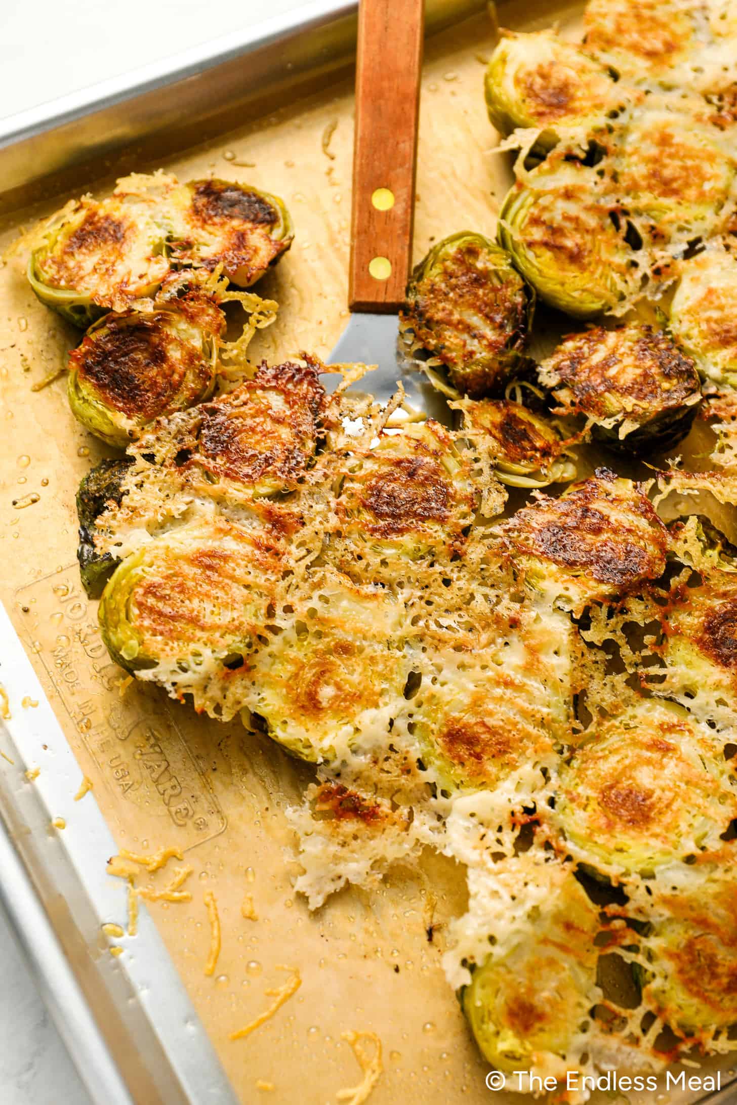 Cheesy Parmesan Brussels Sprouts on a baking sheet