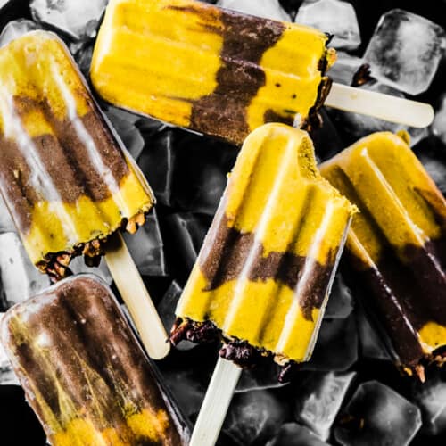 Pumpkin Popsicles on a dessert plate with ice