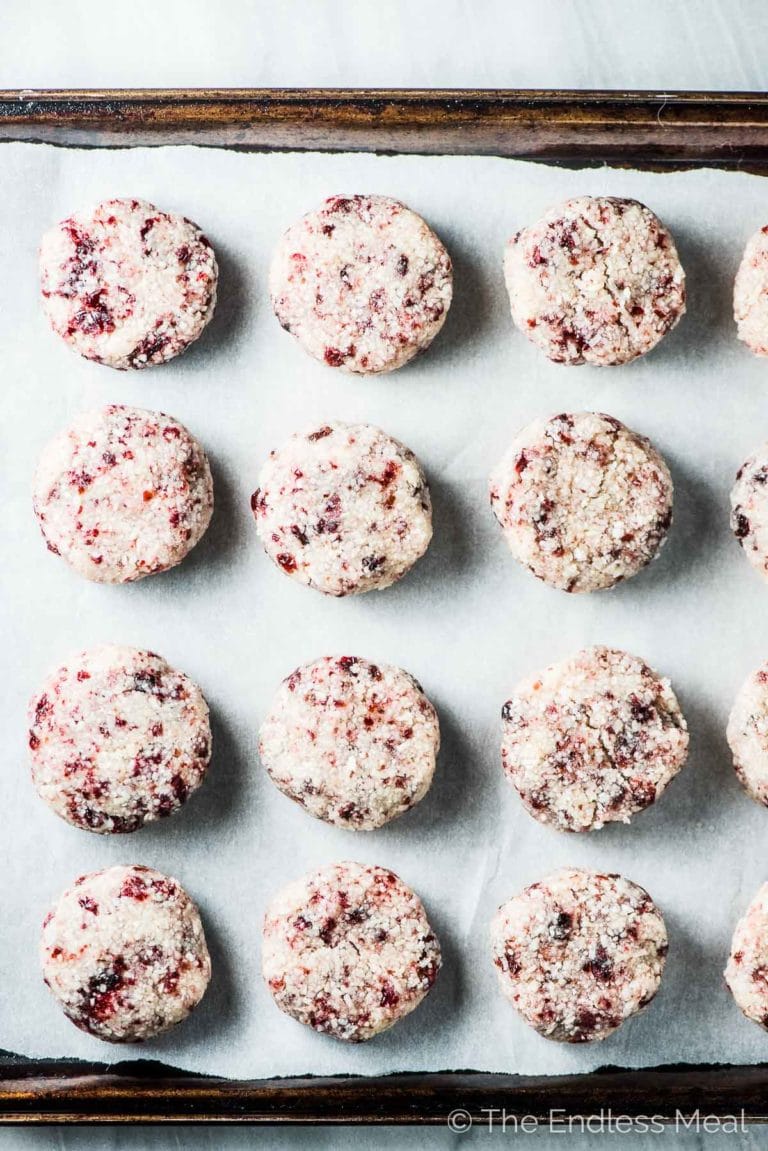 Cranberry Coconut Macaroons on a baking tray ready to go into the oven. 